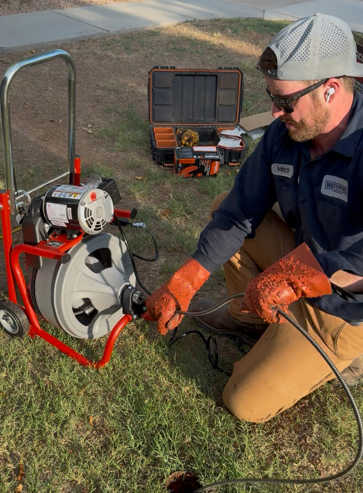 Water Pros Plumbing technician Mitch on-site clearing a drain line in Gilbert, Arizona